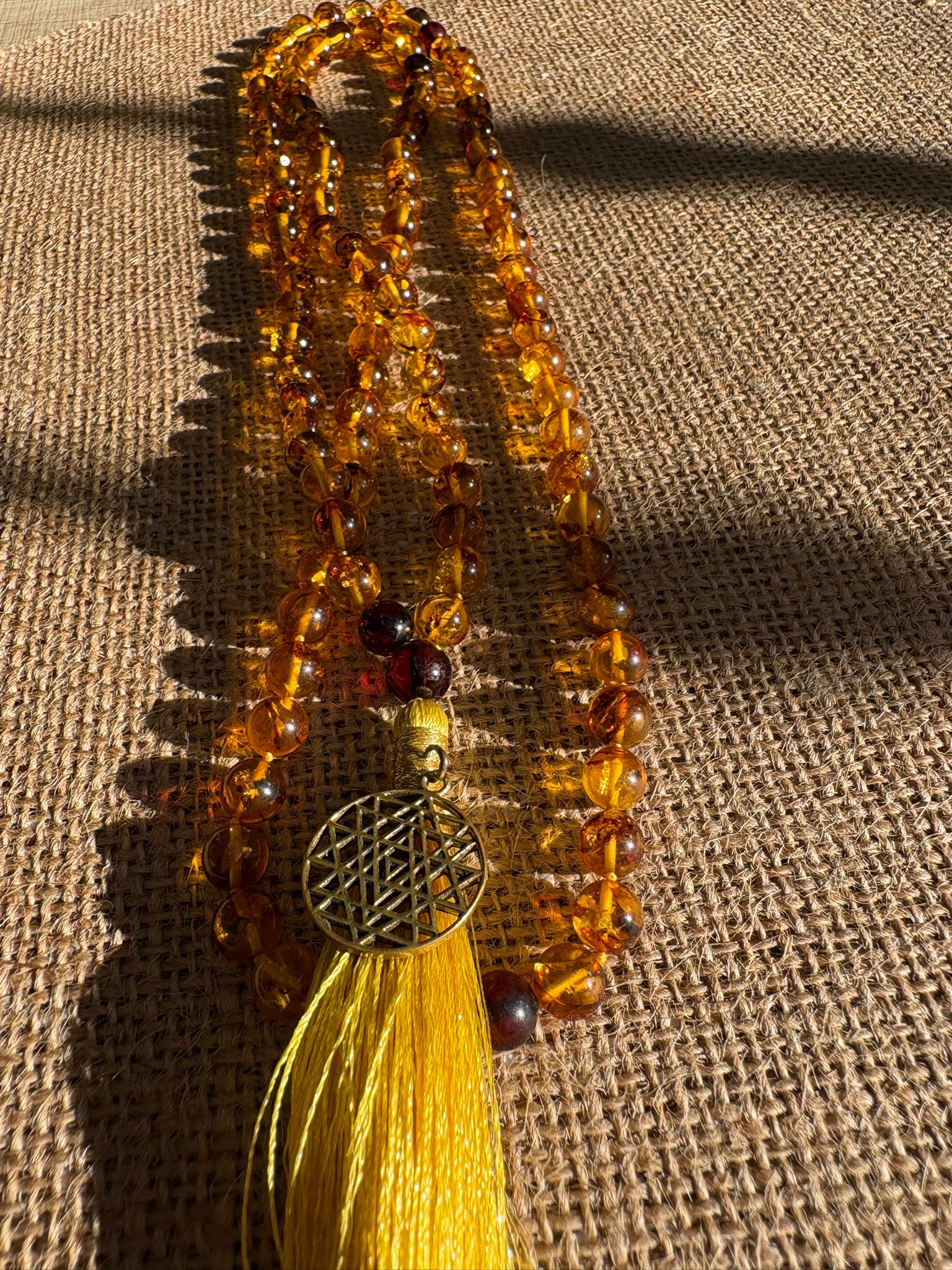 mala bijoux précieux ambre